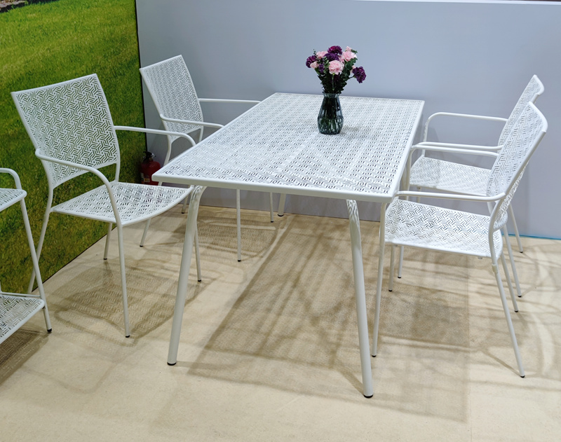 white patio chairs and bistro table