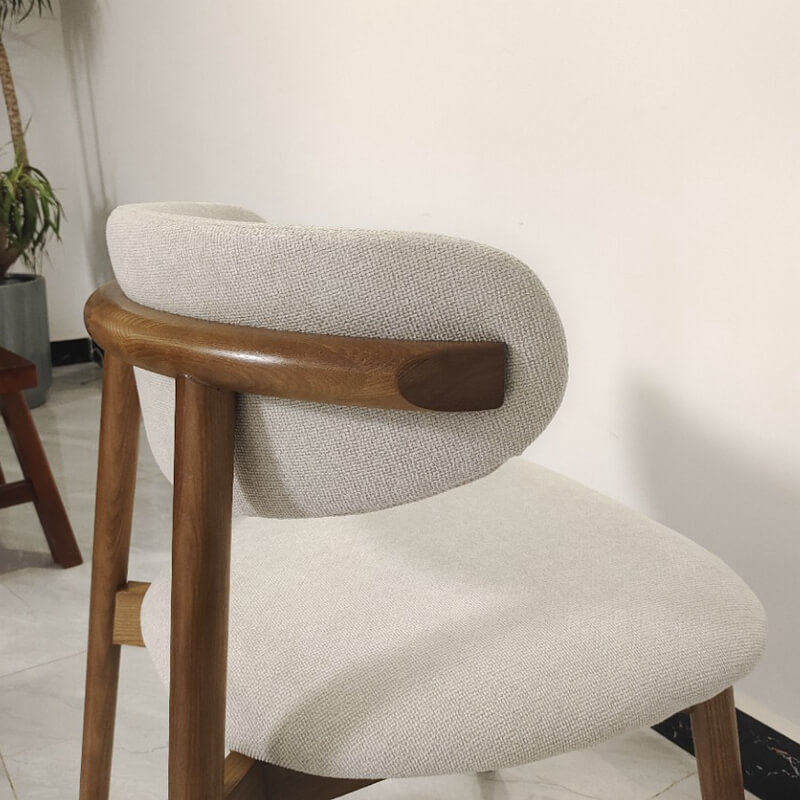 back feature of the curved back fabric dining chair