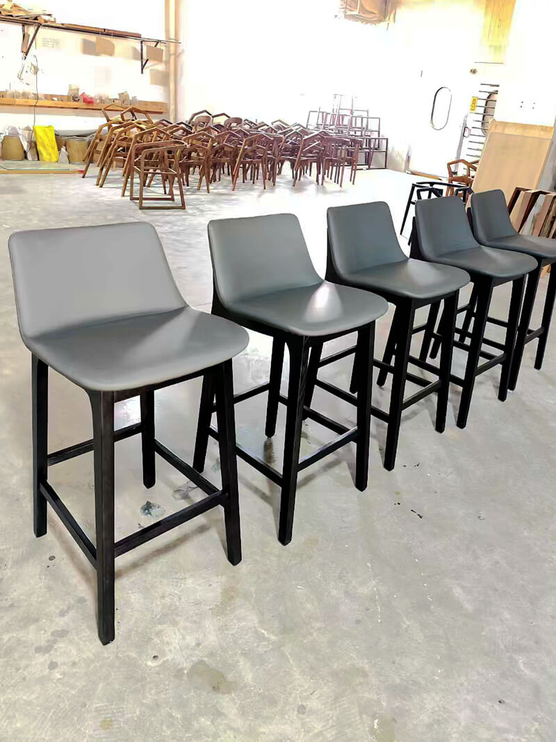 grey leather upholstered counter height bar stools with black wood legs grey leather upholstered counter height bar stools with black wood legs