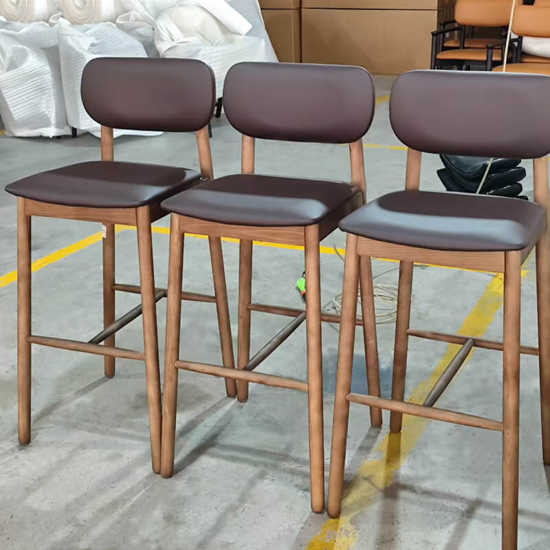 Brown leather cushioned wood bar stools with backs Brown leather cushioned wood bar stools with backs