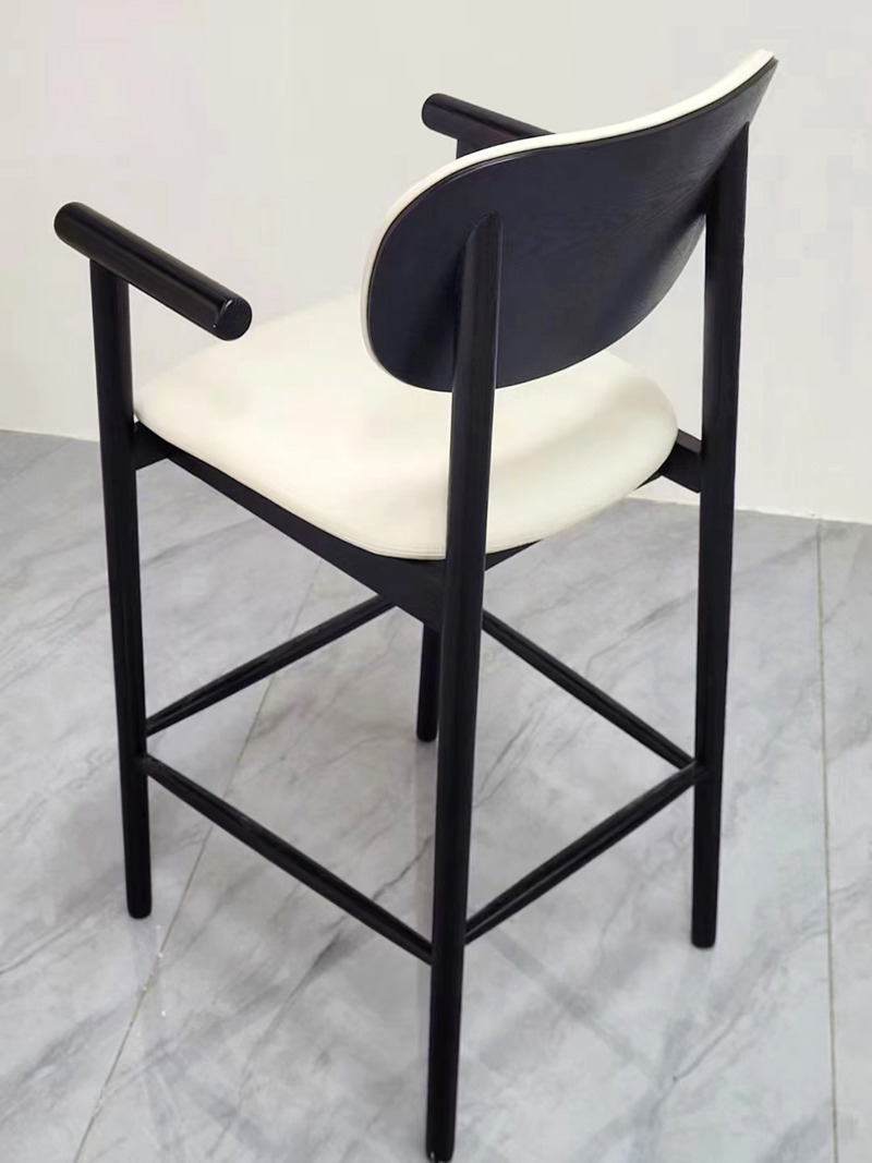 Leather and wood counter stools with arms