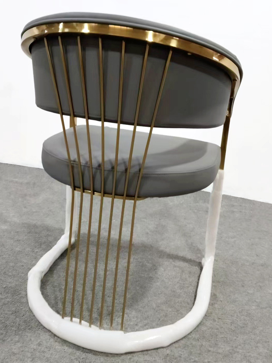 Grey Cushioned Dining Room Chair With Gold Metal Legs