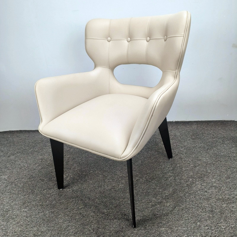 Beige Leather Upholstered Dining Chair With Black Legs